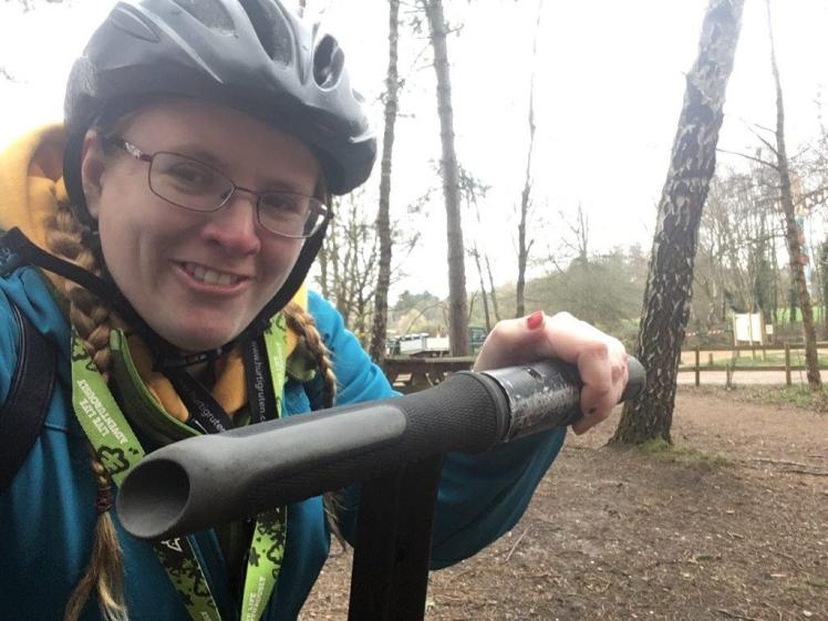 Me, wearing a helmet and yellow hoodie under a bright blue coat, taking a selfie on a Segway. One foot might be on the ground because otherwise this is very brave for my first five minutes on the contraption.