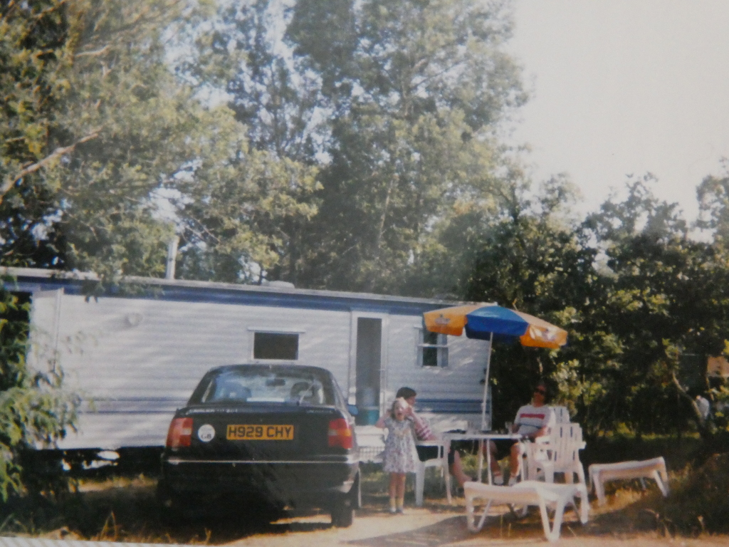 1992 or 1993, outside a Keycamp caravan in France. We're less obvious than the car. Charlie is an H-reg Vauxhall Cavalier in "dark grey"
