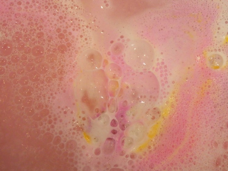 Pink bubbly bath with a Marshmallow World bath bomb in it