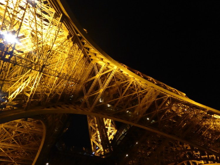 Queuing under the Eiffel Tower's north leg