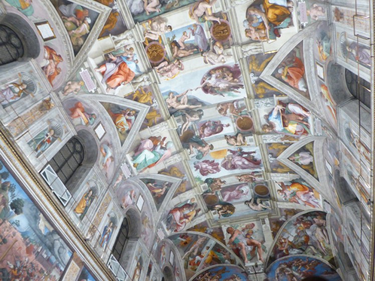 An entirely accidental photo of the ceiling of the Sistine Chapel, as you're not allowed to take photos in there. The entire room is covered ceiling to floor in colourful paintings. I've never seen anything like it.