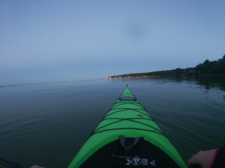 Sea kayaking by night