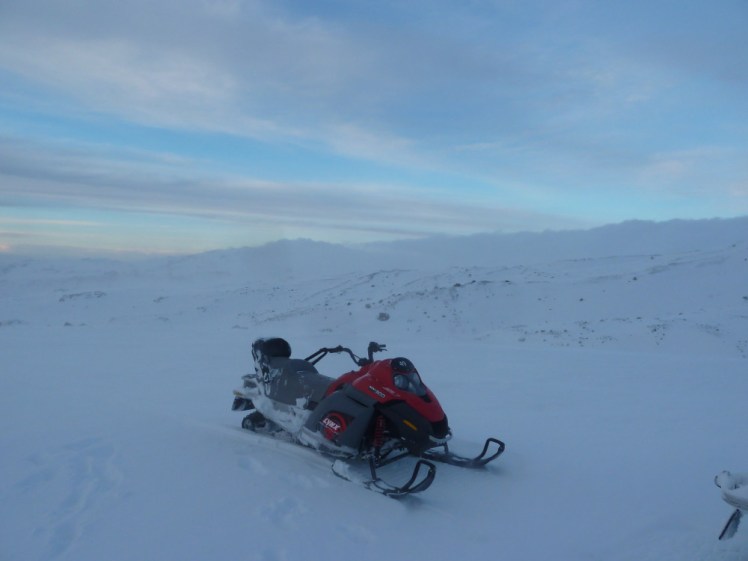 Snowmobiling on a glacier