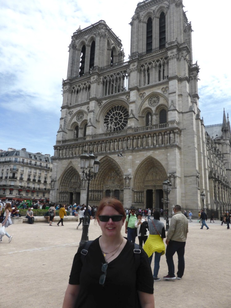 Me outside Notre Dame, pre-fire. I'm wearing my black t-shirt again and my hair is tied out of sight. My sister took this picture and I take back anything I've ever said about her being better at photos than our parents.