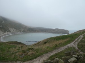 Lulworth Cove in the winter mist and drizzle