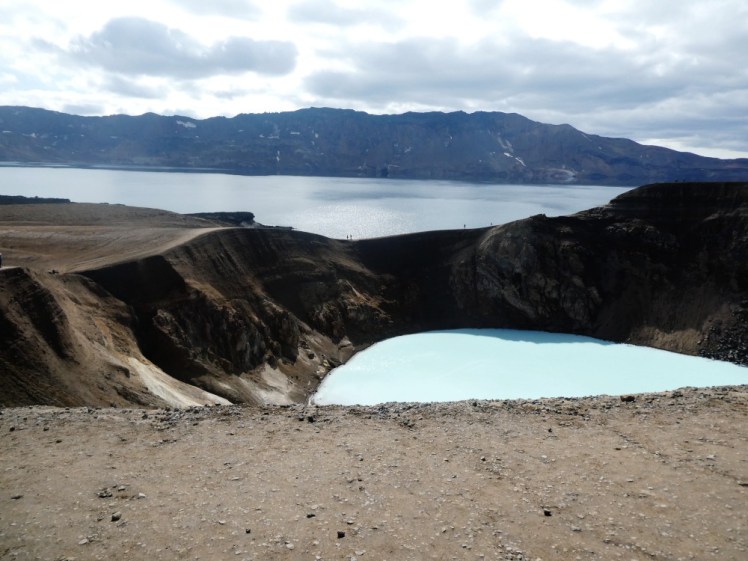 Askja and Viti, a pair of flooded craters, one small and hot and milky-blue, the other huge and freezing and navy blue.