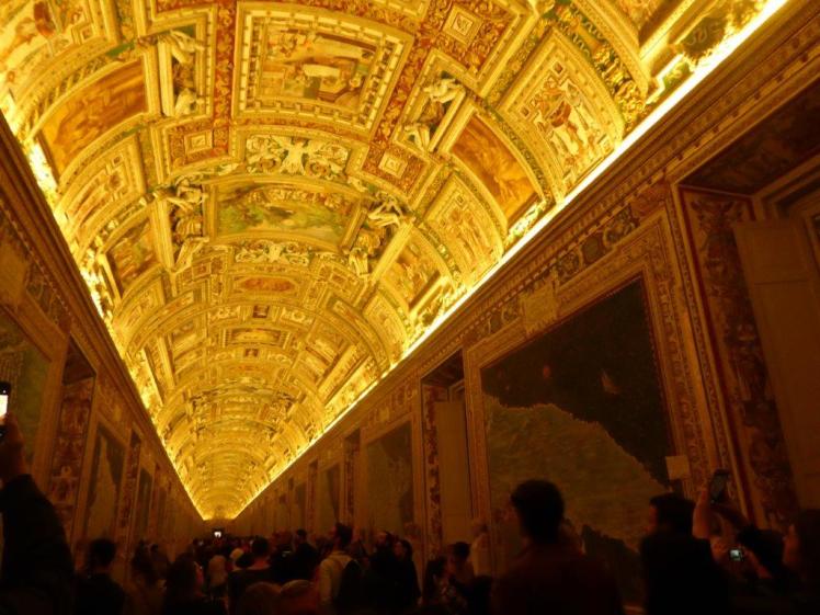Elaborate gold ceiling in the Gallery of Maps