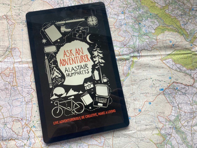 Ask An Adventurer by Alastair Humphreys, as read on my tablet, open on the cover page. The tablet is lying on an OS map of Dartmoor.
