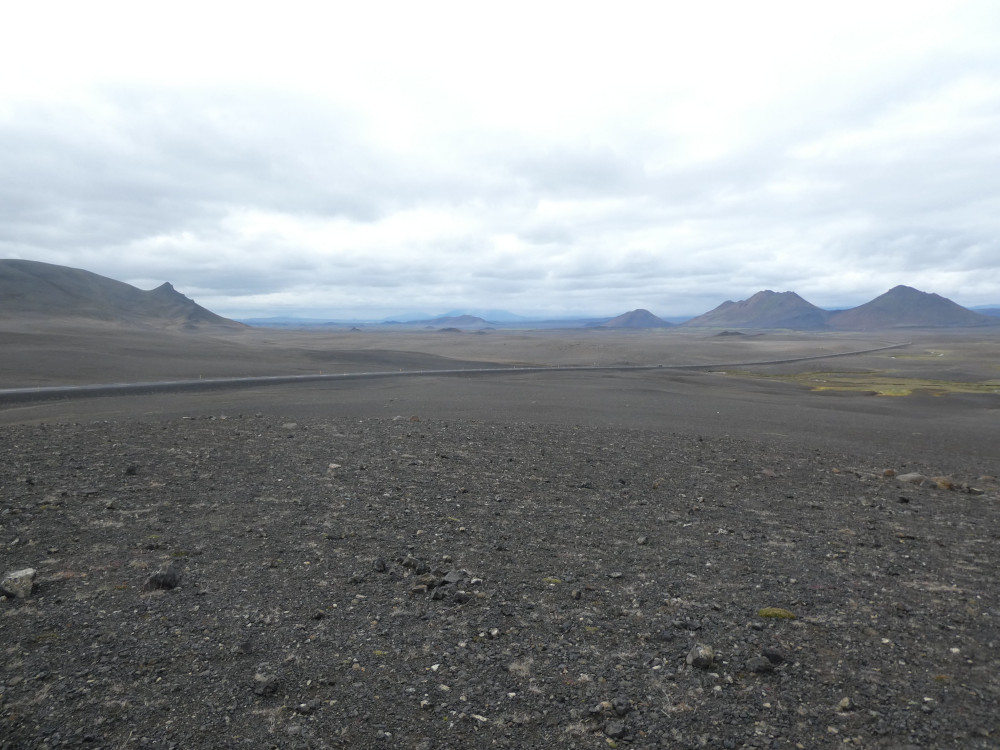 A vast gravelly plain dotted with spiky mountains. If you look closely, a single road - the Ring Road - runs across it.