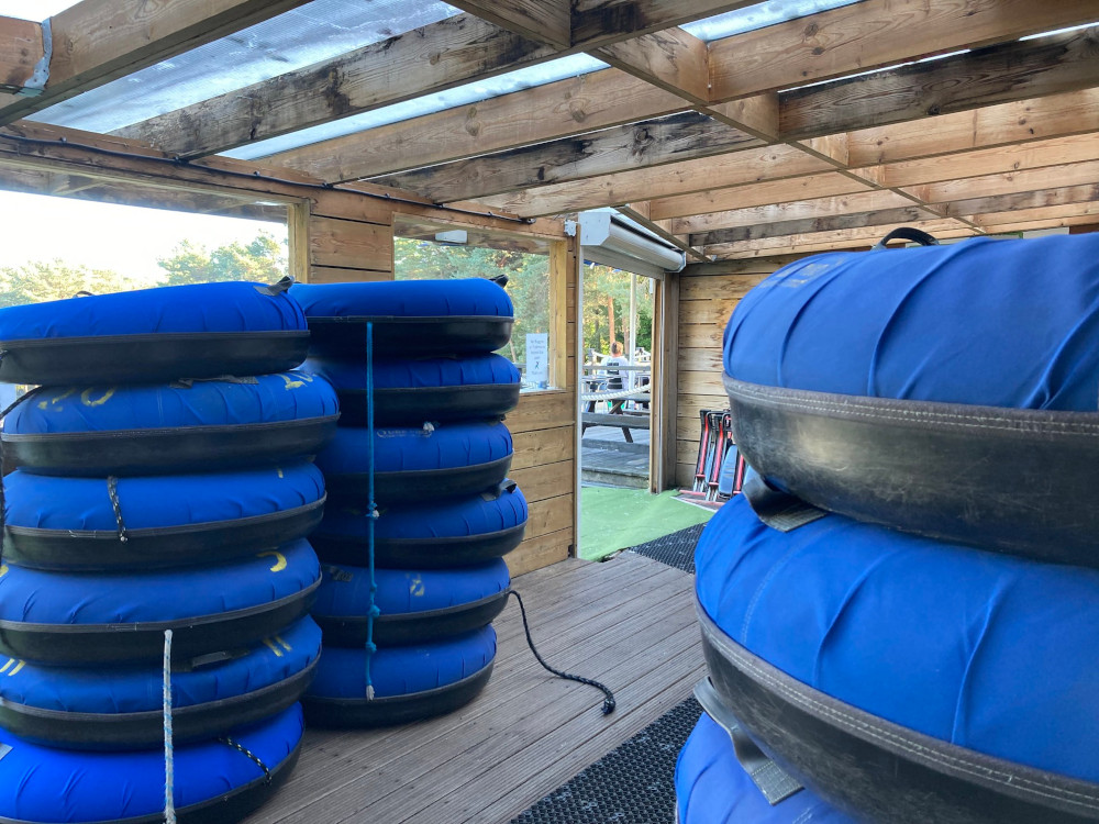 Piles of ringos. They're like inflatable tyres, black on the bottom, covered in a tough blue fabric on top. Each pile is probably six feet tall and there are three piles visible.
