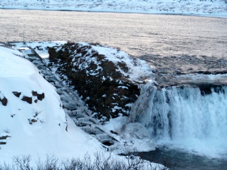 The salmon ladder up the side of Faxafoss, a waterfall with a series of small waterfalls alongside it to allow fish to swim upstream