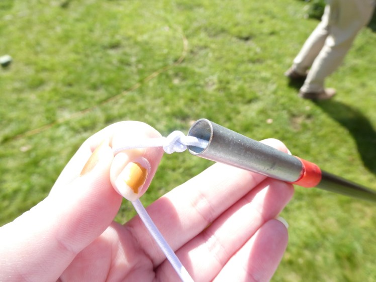 Tying off the last pole