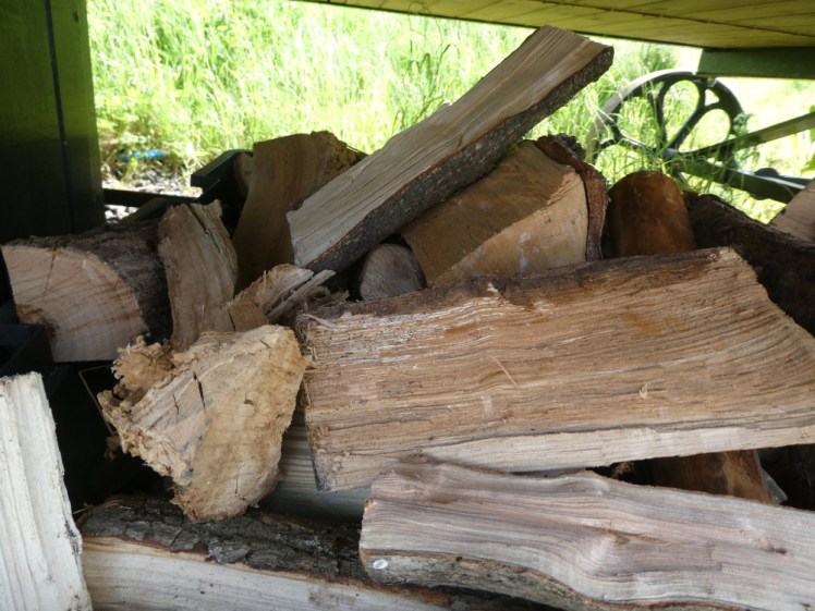Basket of wood under the hut