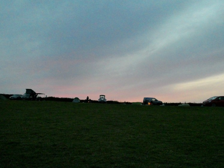 Little fires around the campsite at sunset