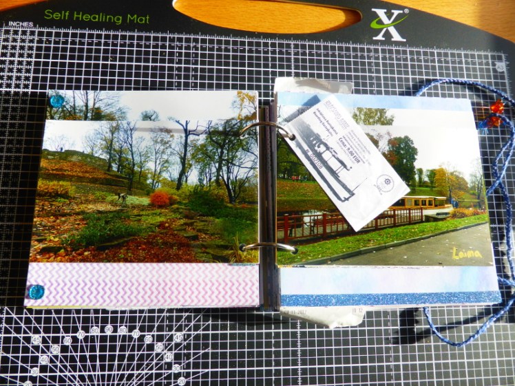 Photo pages in travel scrapbook