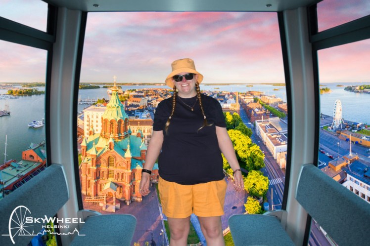 Another, similar, greenscreen photo except this time I'm inside one of the cabins with the doors open, apparently at the top of the wheel, with Uspenski Cathedral behind me and, if you look carefully to the right, the SkyWheel itself.