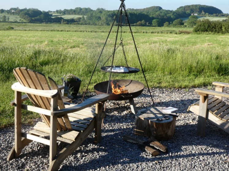 The firepit and cooking tripod