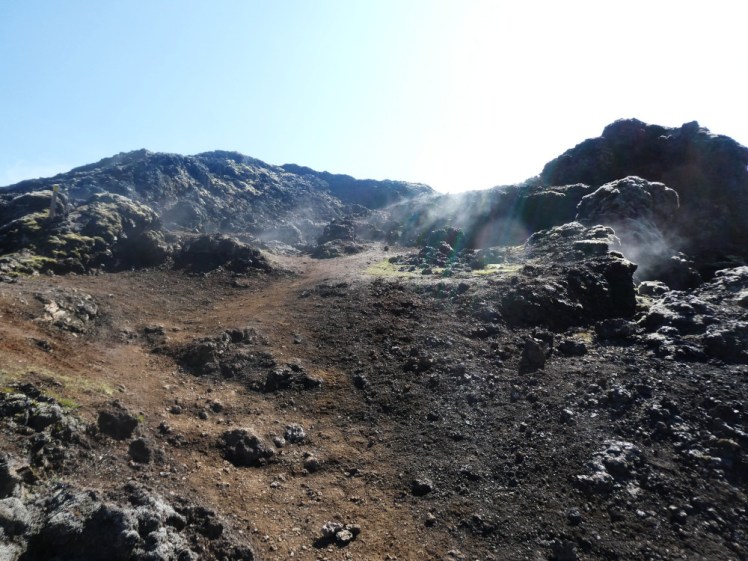Leirhnjúkur, a steaming lava field under a very bright sun.