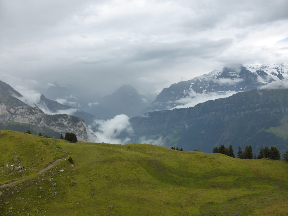 A thick cloud over the mountains of the Oberland. It's so thick that it fills the valley as well as covers the peaks.