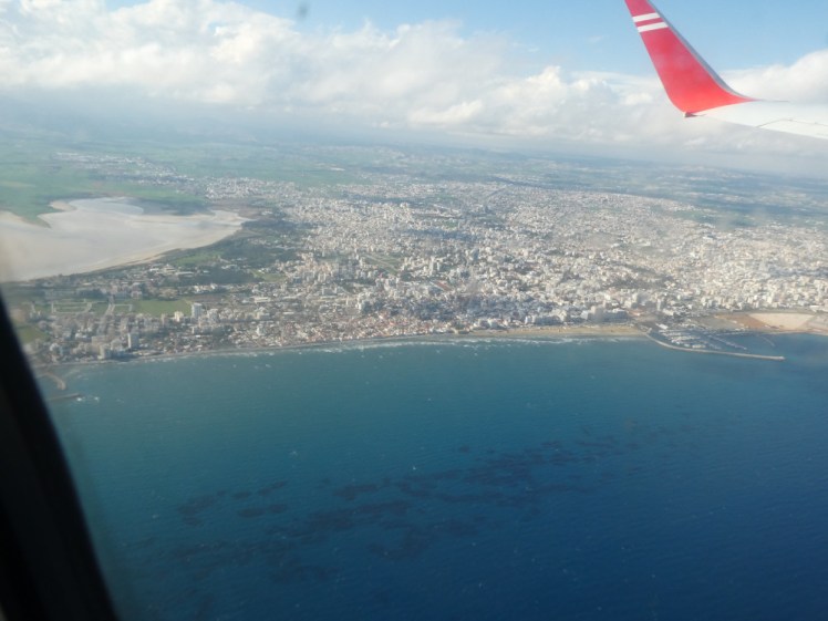 A view from the plane over Larnaca, where the sea is spectacularly blue and the salt lake is kind of silvery.