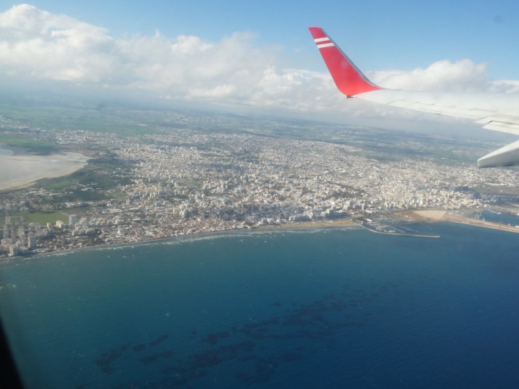A red wingtip over Cyprus. The Med is a spectacular colour and the island stretches away beyond. It's all very beautiful.