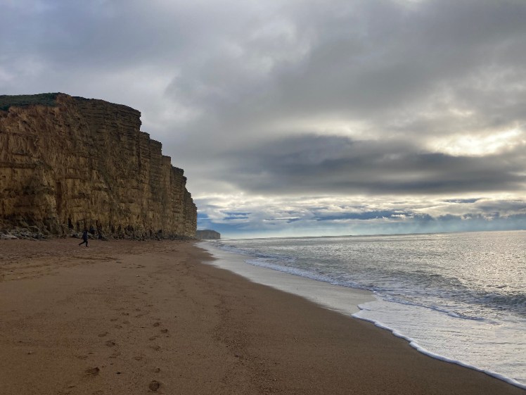The big golden cliff on the west beach of West Bay.