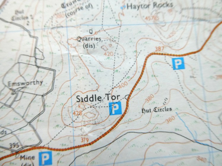 Thin black dashed lines crossing Saddle Tor.