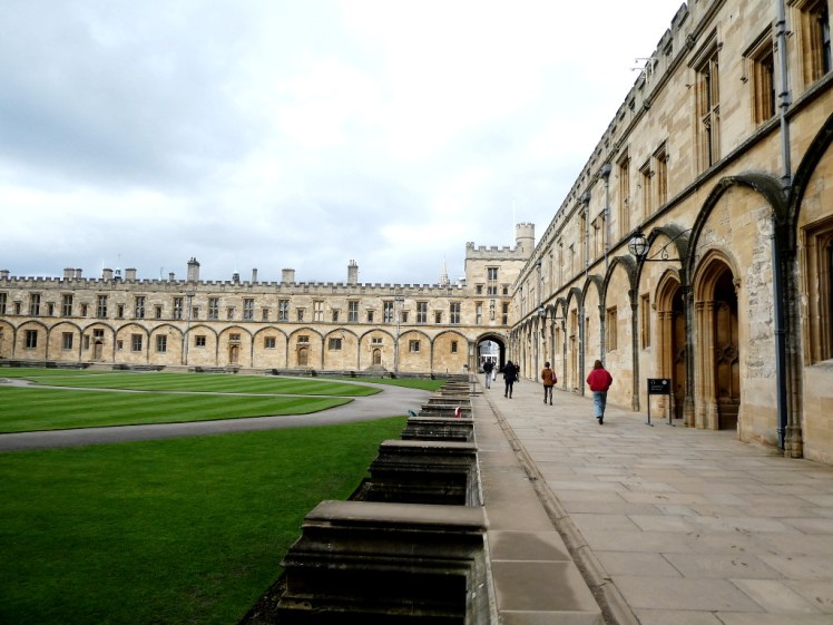 Along the bottom edge of Christ Church's Tom Quad. More yellow stone buildings surrounding a big square of grass.