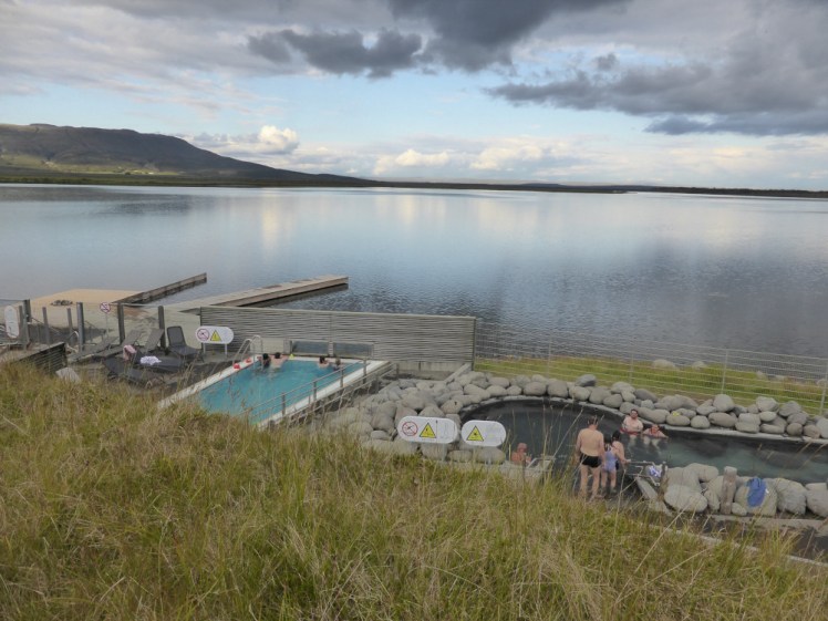 Laugarvatn Fontana, a series of pools of various shapes, sizes and colours set on the side of a lake. I seem to have taken the photo from the turf roof of the building that shields it from view from the village.