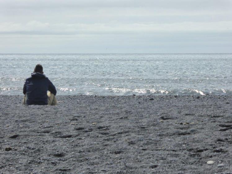 Jake on the beach at Vik