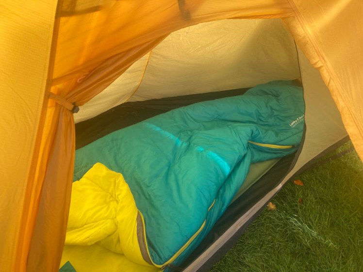 The tent with its inner sleeping compartment open so you can see the length of the sleeping bag.