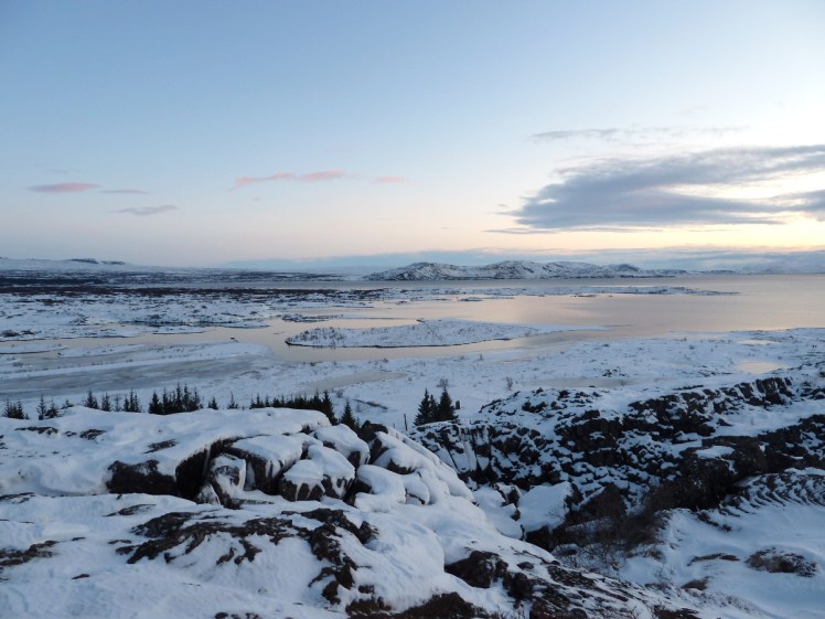 Þingvellir in winter, Þingvallavatn lake gleaming in the late afternoon pale setting sun.