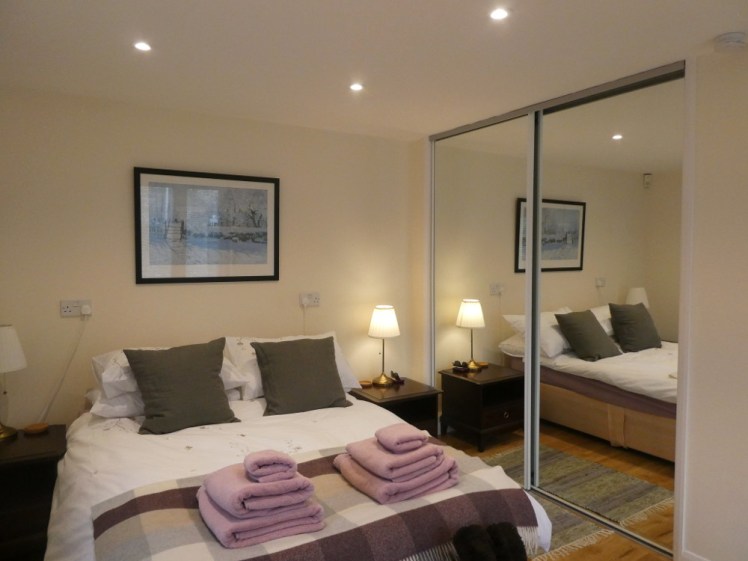 My bedroom - more purple, and full-length mirrored sliding wardrobe doors