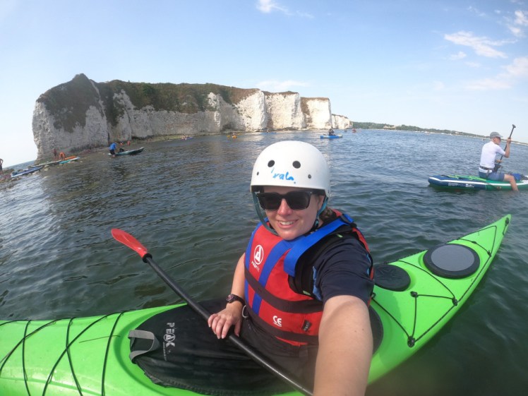 Last kayak selfie: me with the chalk cliffs and headland behind me, on the still flat Studland Bay side. You can't see Old Harry because it's off the left of the picture but you can see the gap we paddled through, now well filled with water as the tide comes in.