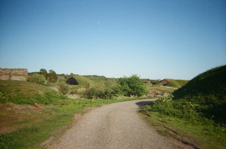 An area of underground bunkers on Suomenlinna, with grassy sides and roofs that makes the whole area look like Hobbiton.