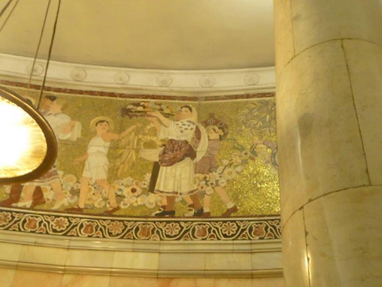 I think this is Kropotkinskaya station but I can't find pictures of this exact mural