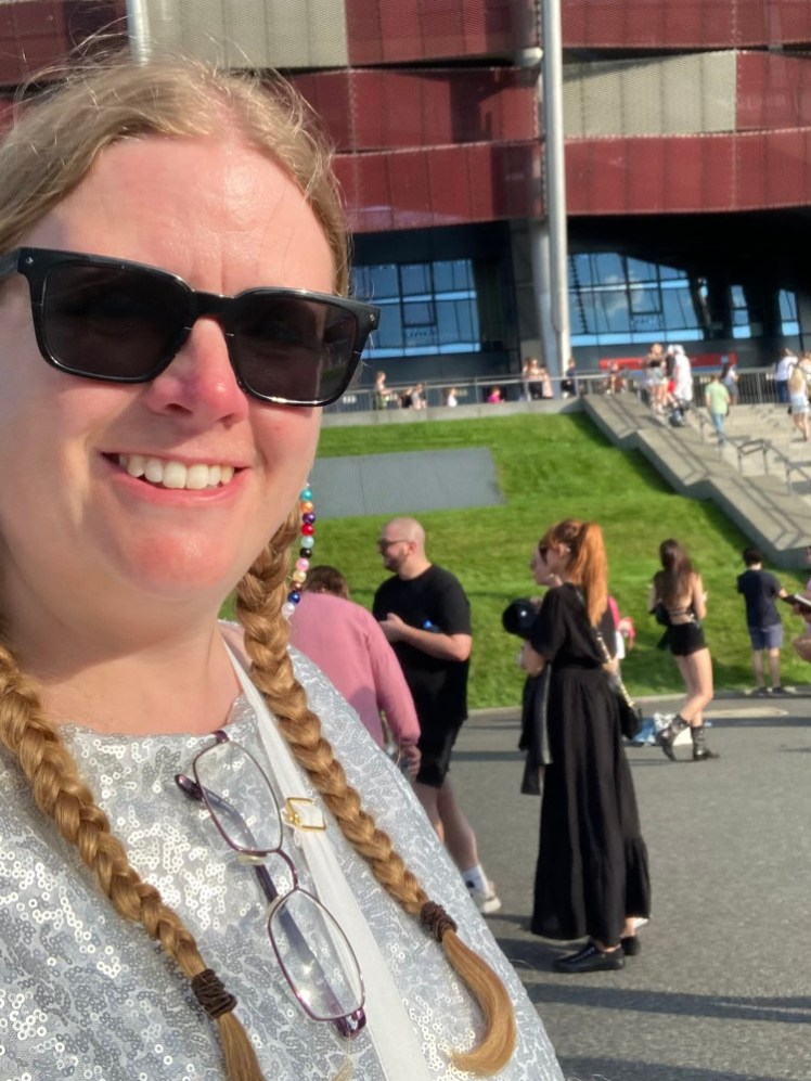 A selfie outside the stadium in my silver sequin dress, which is just about catching the sunlight.
