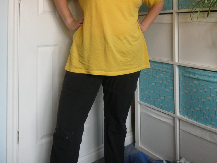 The yellow top photo cropped so you can see the grippy diamonds on my trousers and an extra hem just above the knees where the legs zip off to turn them into shorts.