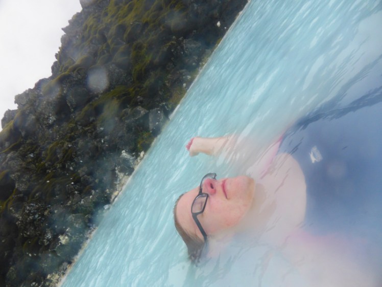 In the hot water in the Blue Lagoon in the rain
