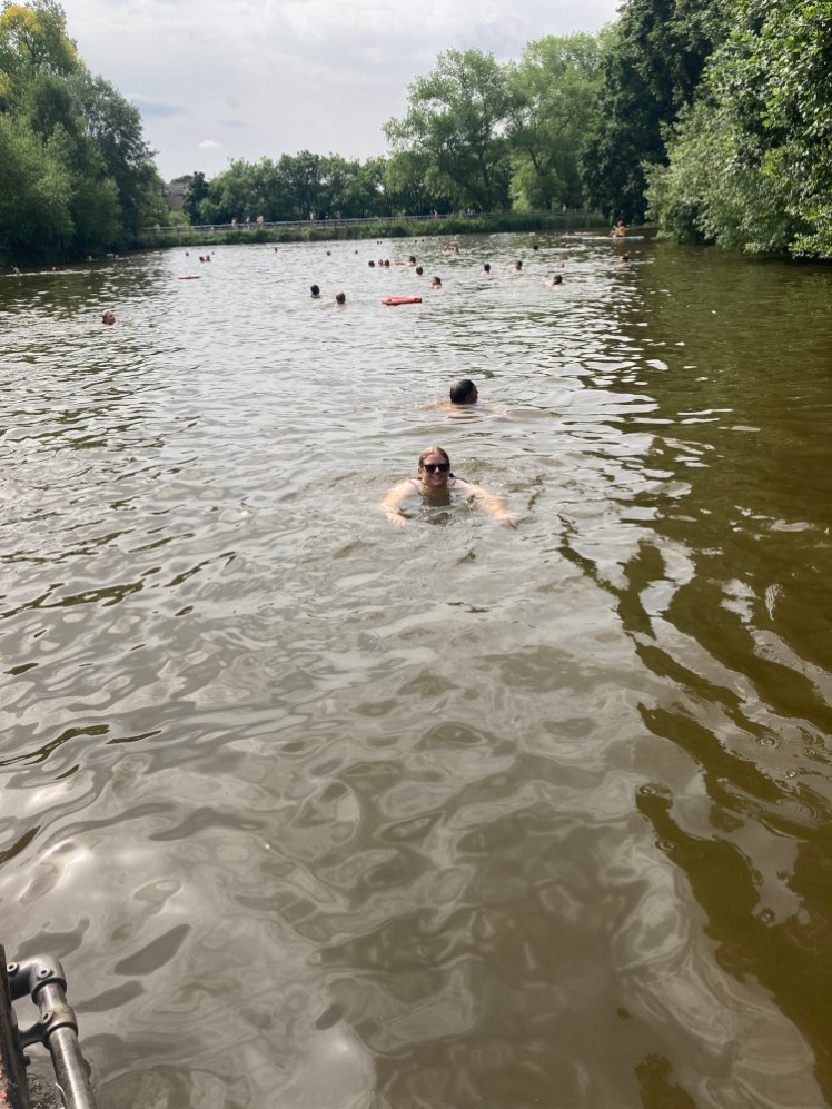 Me swimming in the water, arms outstretched and everything. You can just make out the bar I'd been clinging to on the edge of the pontoon where the lifeguard is holding my camera.