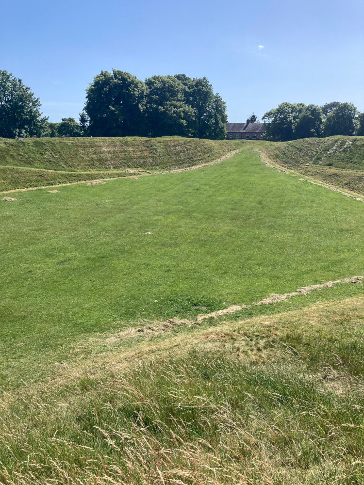 Maumsbury Rings, a small hillfort with one set of rings. It's... ummm, pointed at each end.
