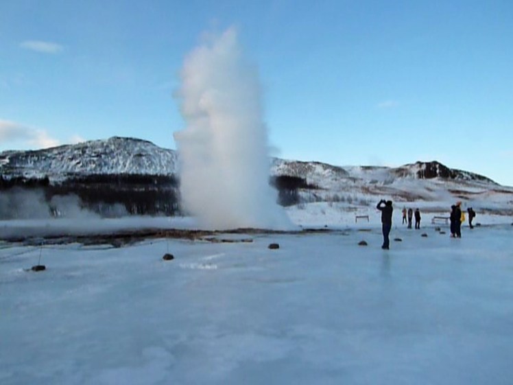 Strokkur eruption in winter. This one was caught on the way down so it's smaller.