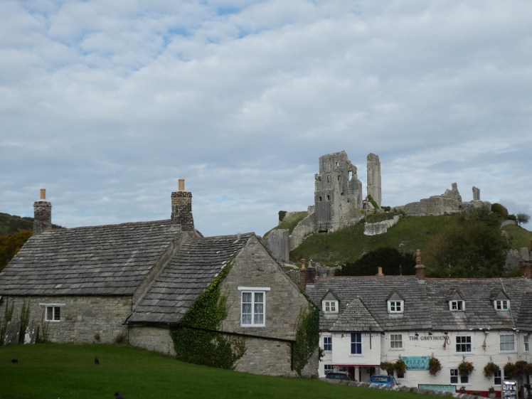 Corfe Castle looming over the village. It's all grey stone. It's chocolate-box perfect.