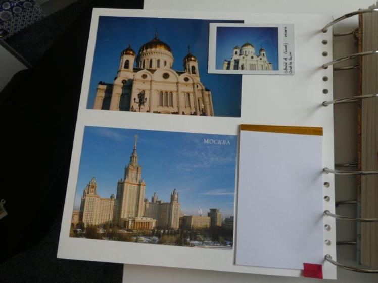 Another calm-ish page. A photo of the Cathedral of Christ the Saviour at the top, overlapped by an Instax of it. A photo of one of Stalin's Seven Sisters at the bottom. In the bottom right is a concertina of small index cards, folded down.