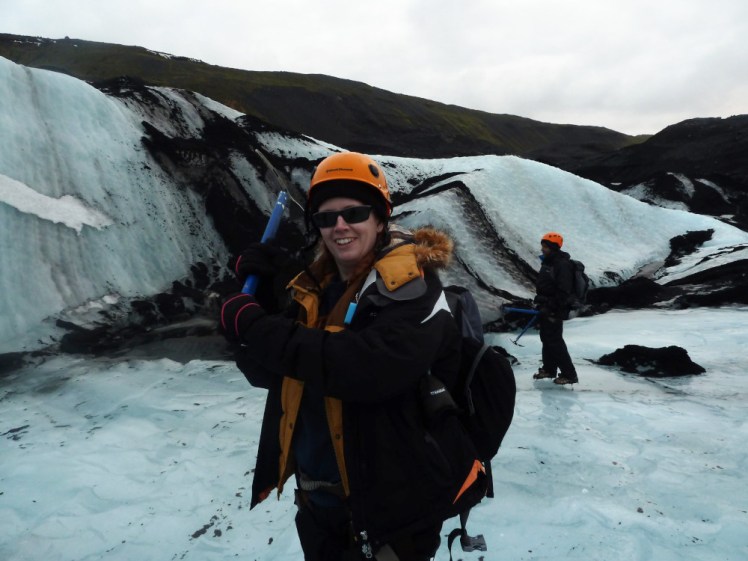 Me posing on a glacier, which is also covered in black ash from the Eyjafjallajojull eruption two years earlier. I'm holding my axe as if I'm trying to smash it down into something but I'm clearly not pulling it back far enough and am just posing.