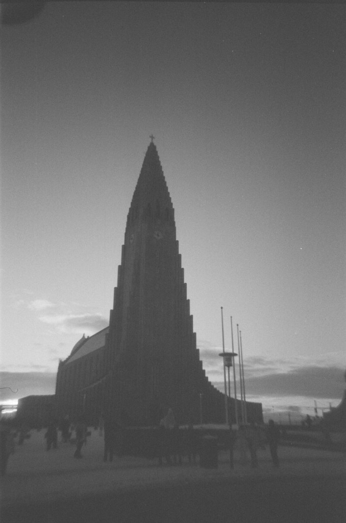 Reykjavik's Hallgrimskirja in dark grey silhouetted against a slightly lighter grey sky. This is one of the much better pictures of this pretty bad batch.