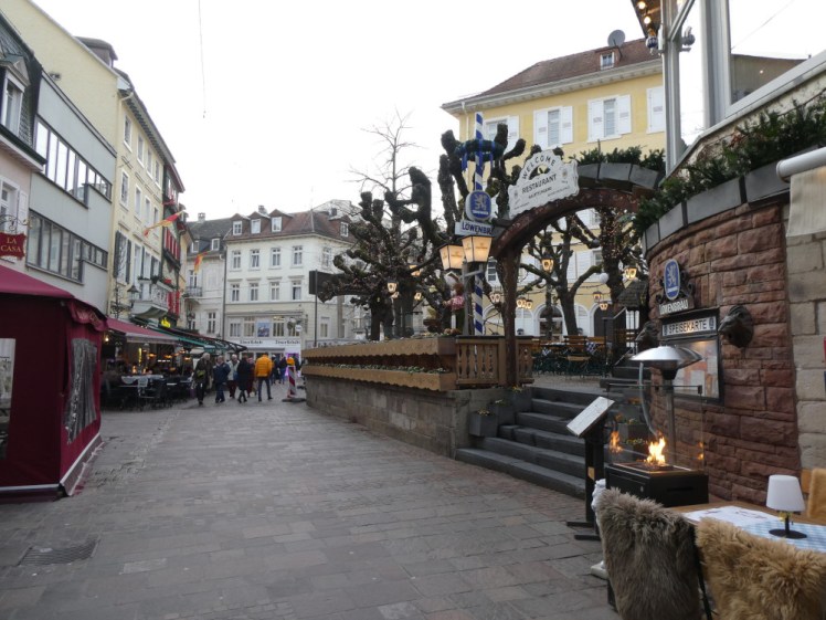 The back streets of Baden-Baden, where the streets are narrower, the buildings are more yellow and a Bavarian-style restaurant with weird misshapen trees dominates the road.