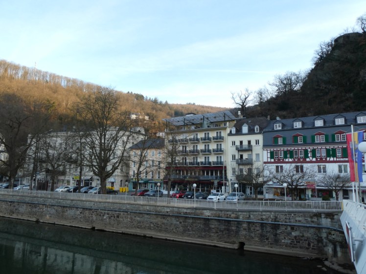 The view across the river of my hotel along with the other buildings forming a line along the riverside.