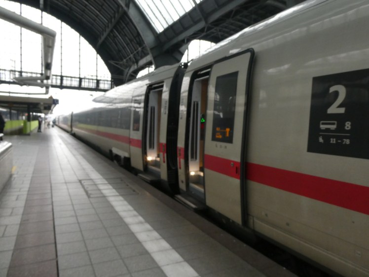 A light grey/off-white ICE train parked at Karlsruhe. It's probably been there a while and probably going to stay there a bit longer.