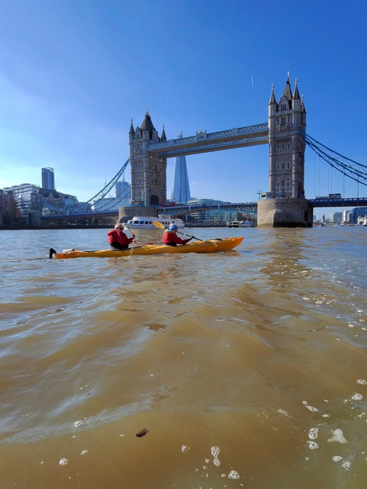 Our kayak angled slightly so Harry can get a picture of us with Tower Bridge in the background.